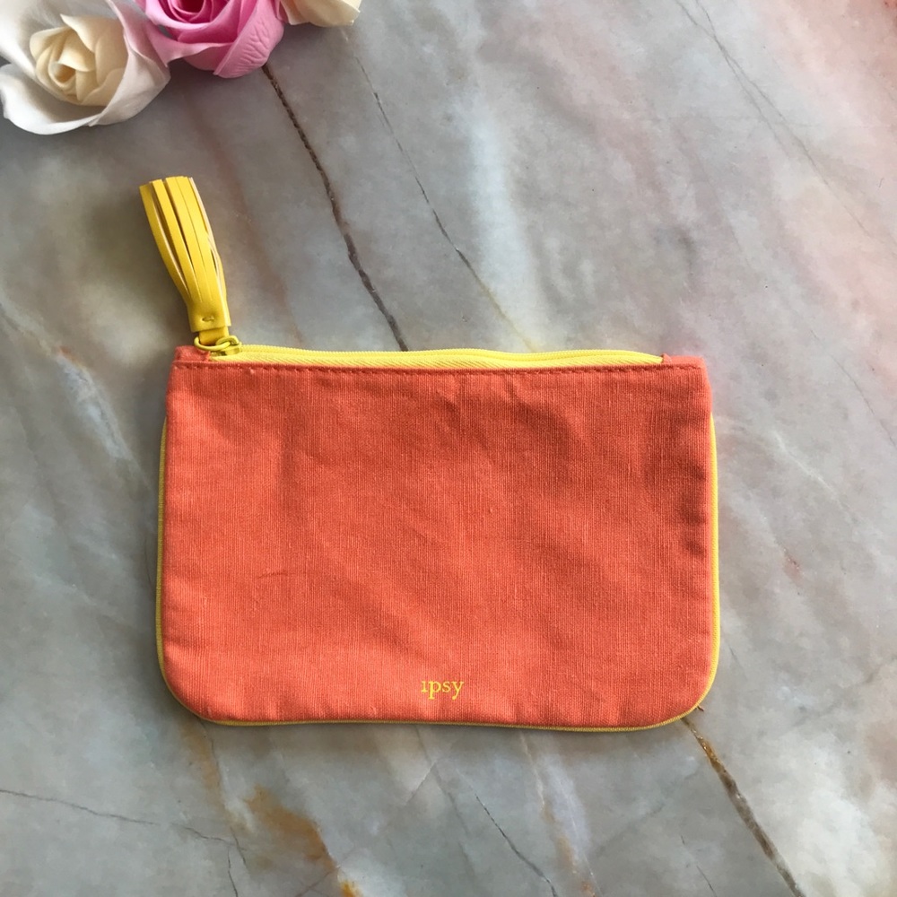 Orange and yellow makeup bag w/tassle A171